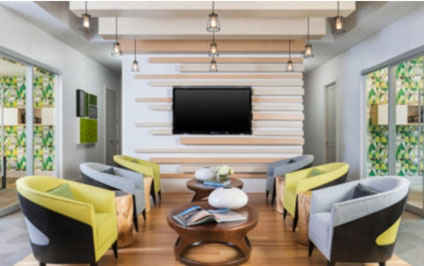 Seating around a coffee table in front of a television