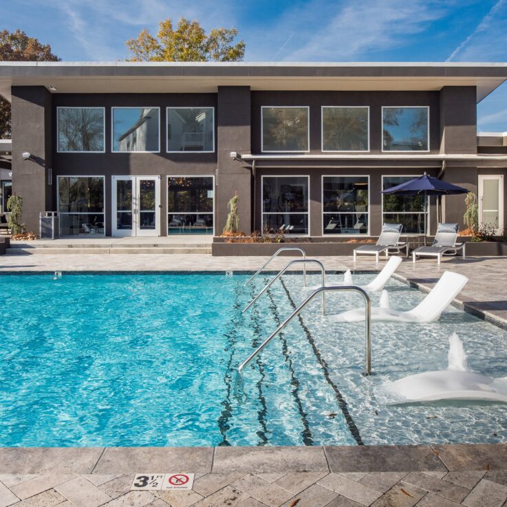 Outdoor pool with seating in very shallow area