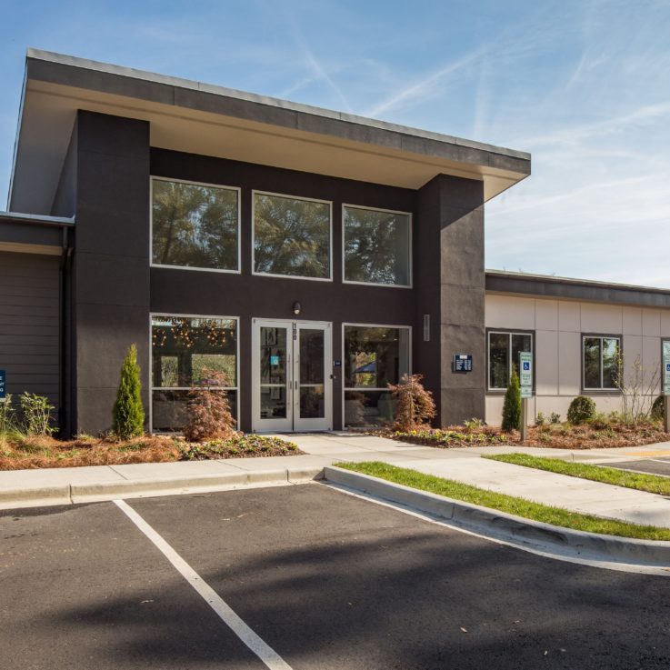 Parking and front entrance to the building