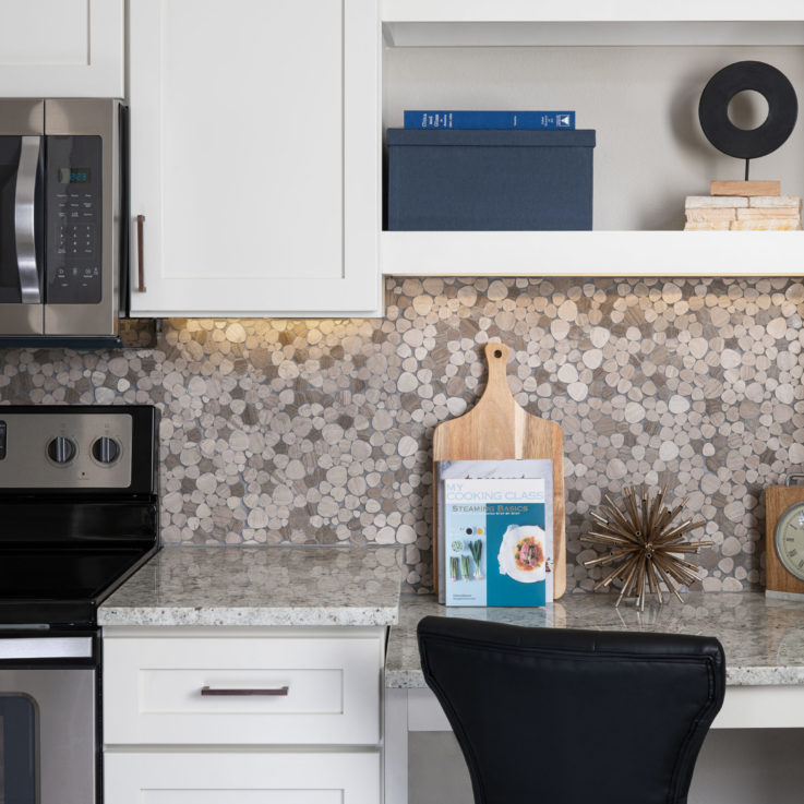 Marble countertops with white cabinets