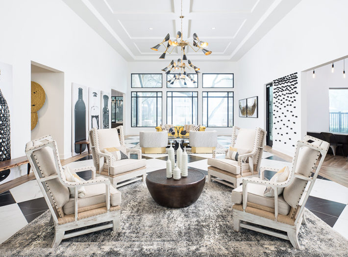 Black and white themed sitting area with leather cushions