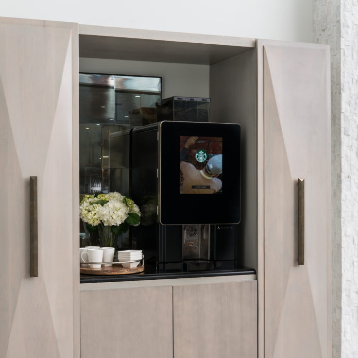 Coffee maker in a cabinet
