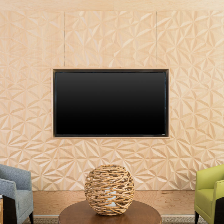 Flatscreen television on a beige wall