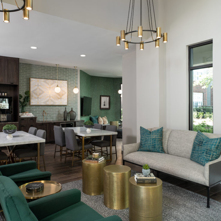 Seating and dining area with a coffee maker and mini-fridge