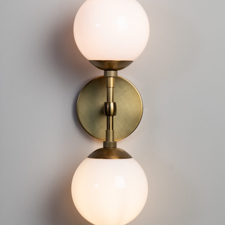 Closeup of a wall light with two bulbs