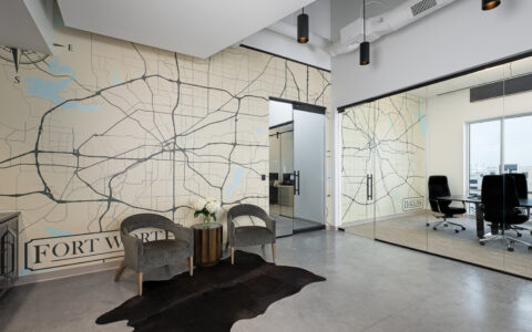Seating area and conference room with glass walls at Cortland's Dallas headquarters