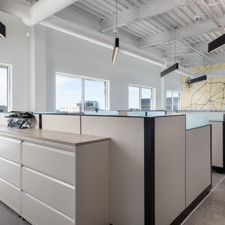 Filing cabinets and cubicles with hanging lights