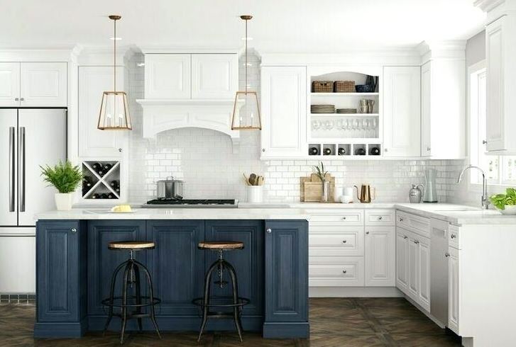 Kitchen with white cabinet, white walls, a dark blue island, and stainless steel appliances