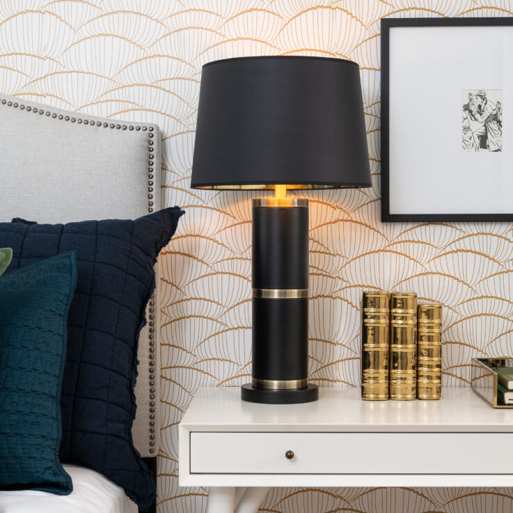 Black bedside lamp on a white table