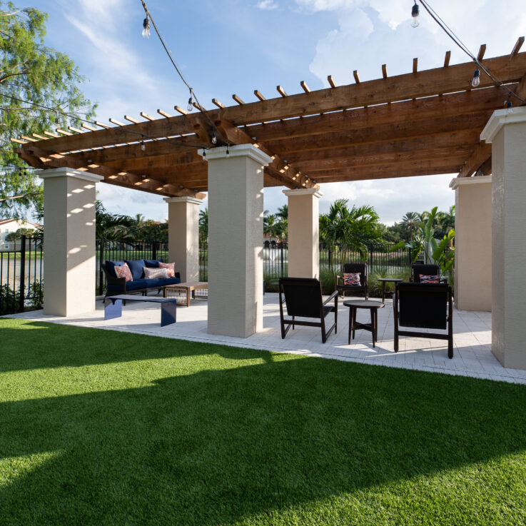 Outdoor seating area next to a lake