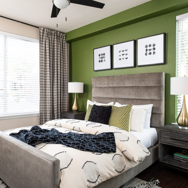 Cortland Mountain Vista Bedroom wit Green Wall and Photos