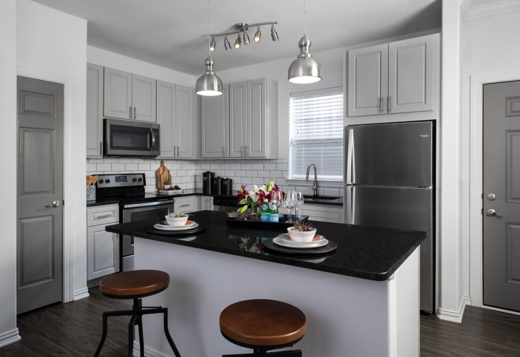 Kitchen counter with bar stools 