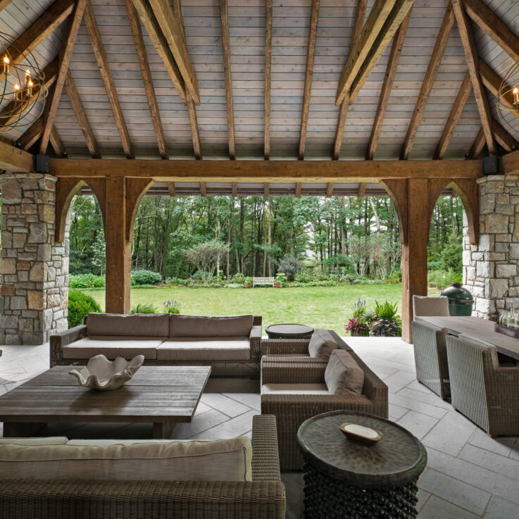 Outside patio with chairs and TV