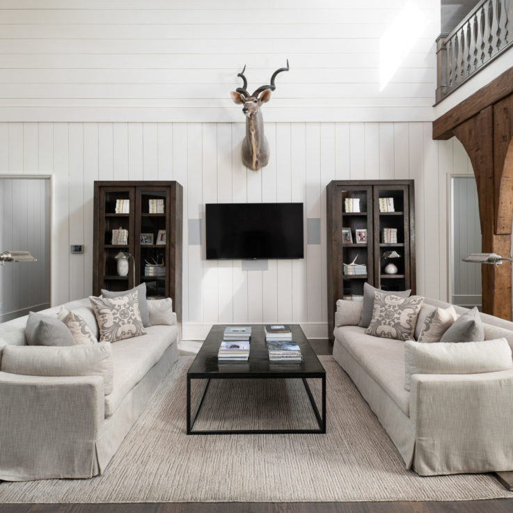 Living area with couches and TV