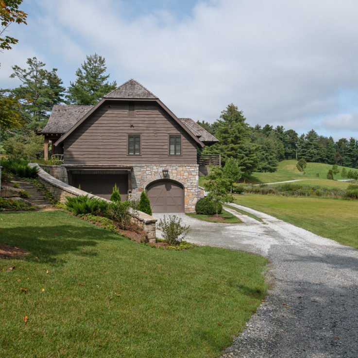 House next to road and greenery