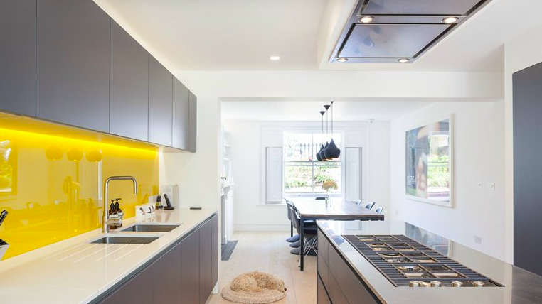 Kitchen with Yellow Black Splash