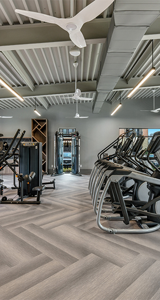 Fitness center at a Cortland property